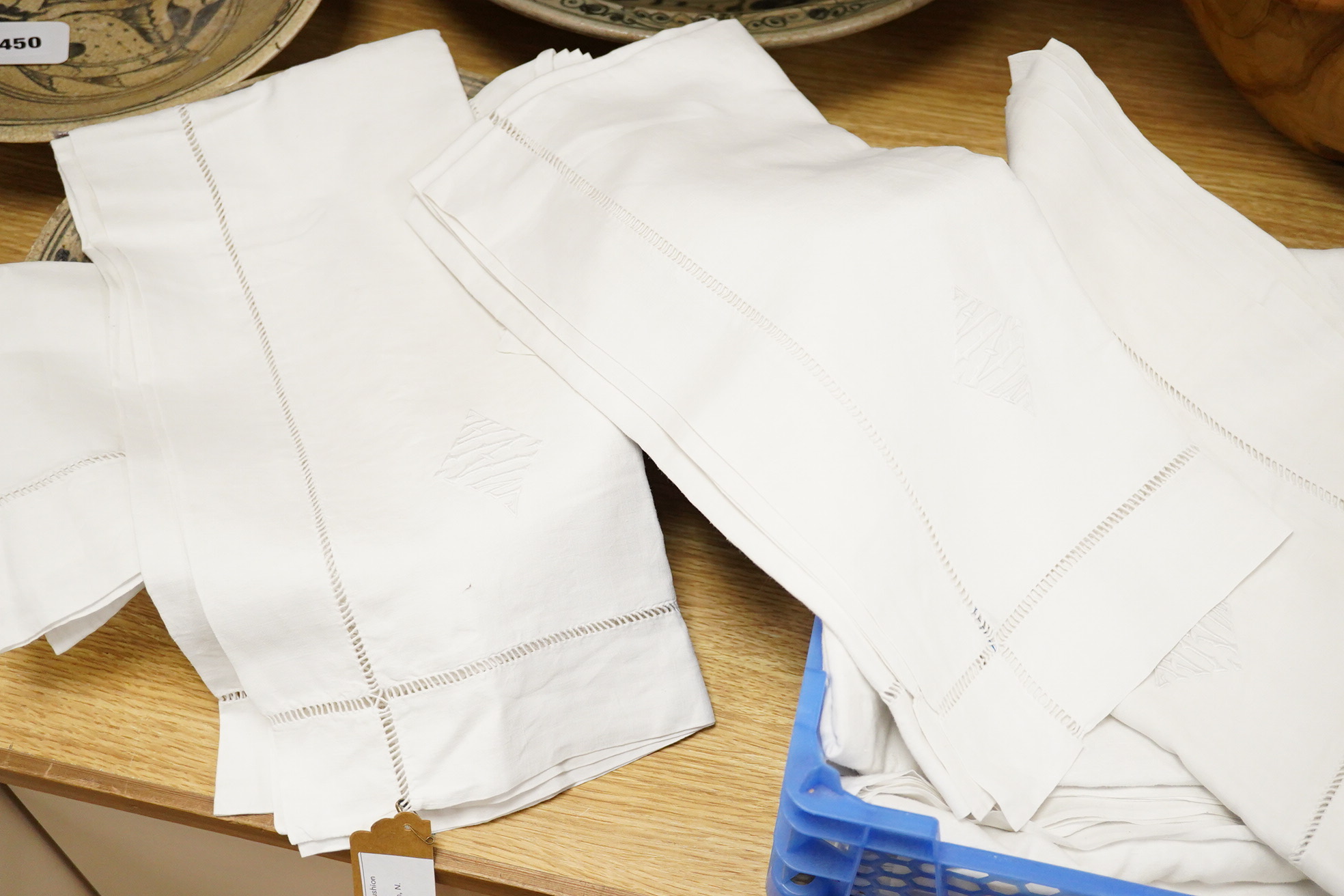 Two matching linen hand monogrammed sheets, one 216cm x 330cms, the other 212cm x 340 cms, together with three later monogrammed linen pillow cases and three embroidered cotton pillowcases.